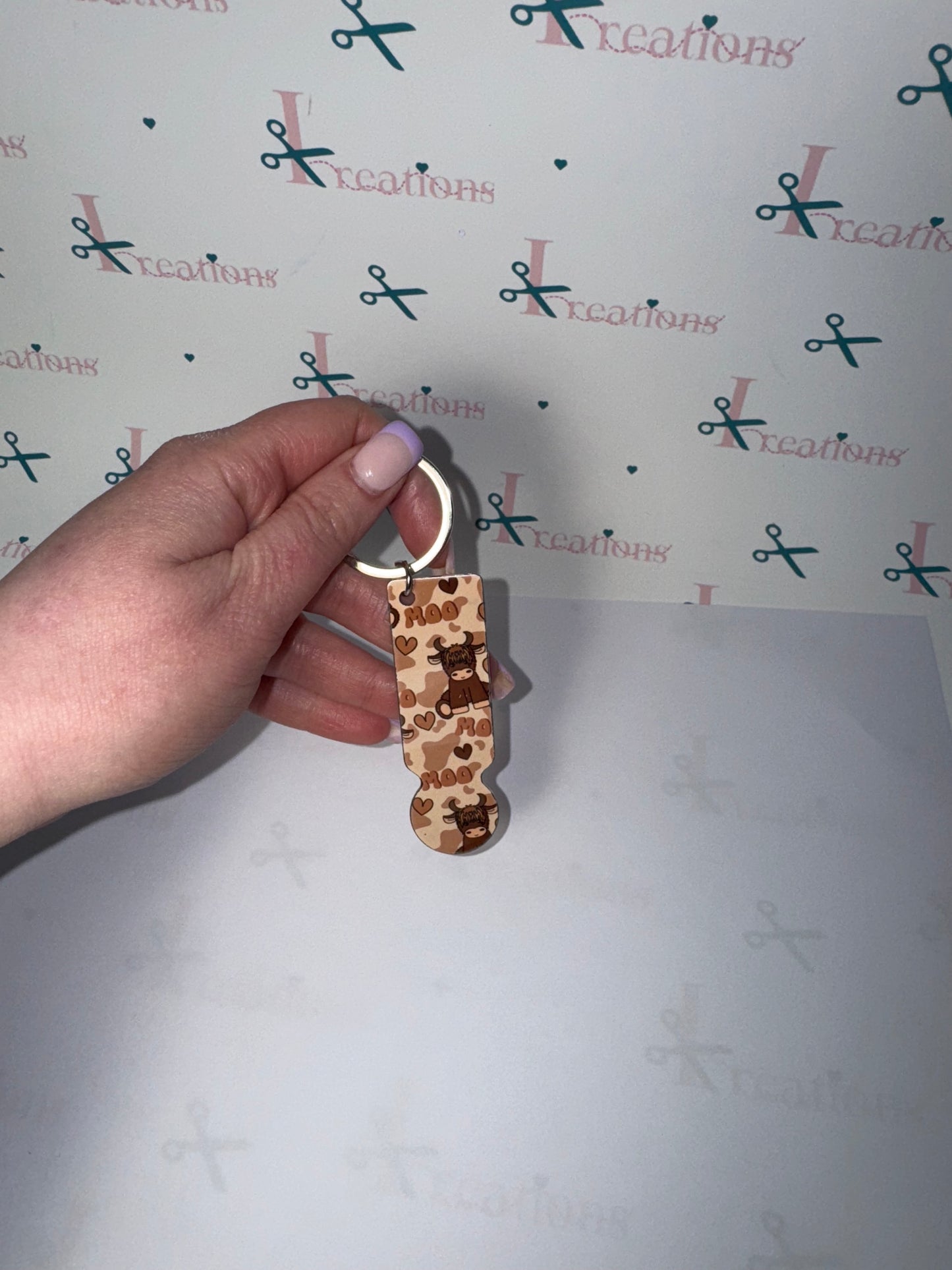 Highland cow trolley Keychain 🐮🤎