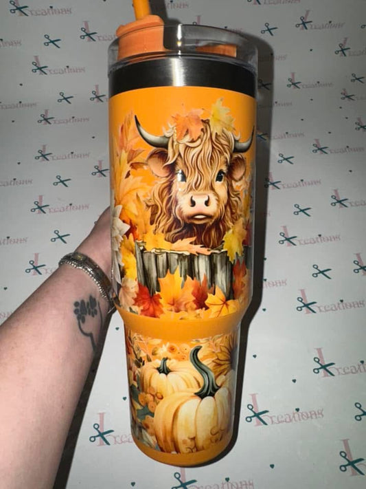 Whoopsie Highland Cow 40oz orange tumbler